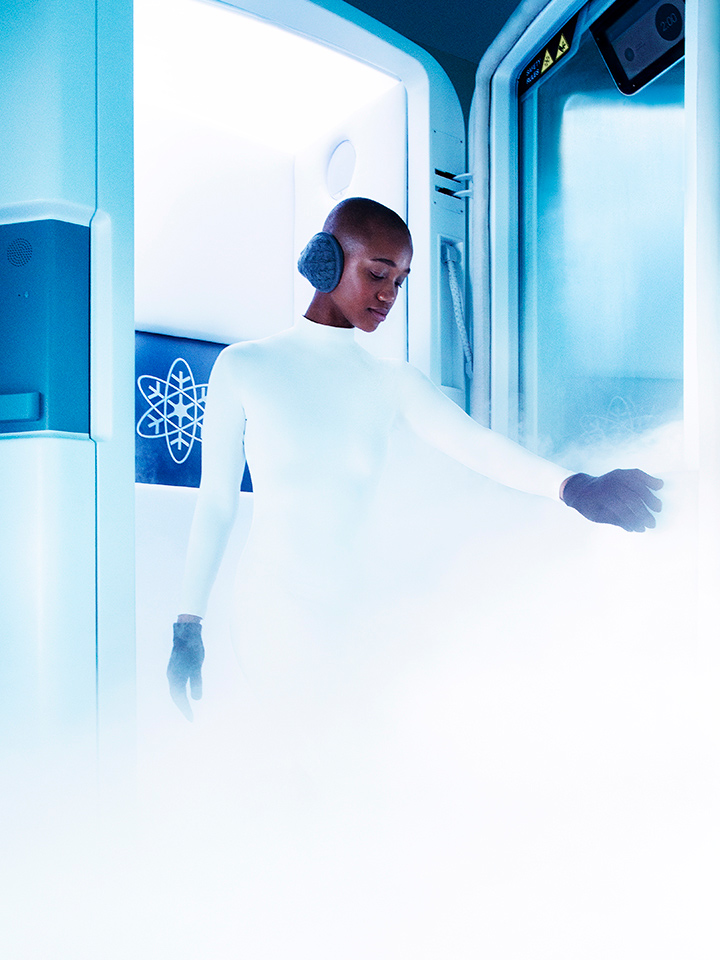 woman in white walking out of frozen room