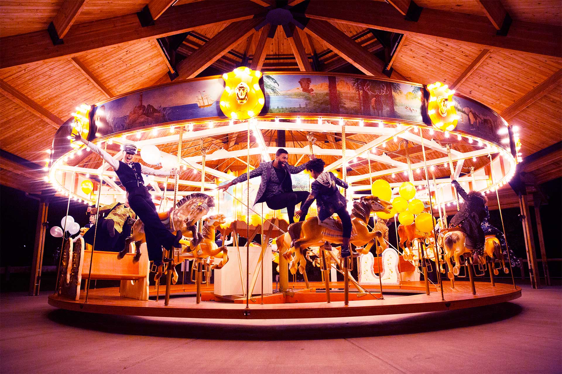 People standing on a carousel