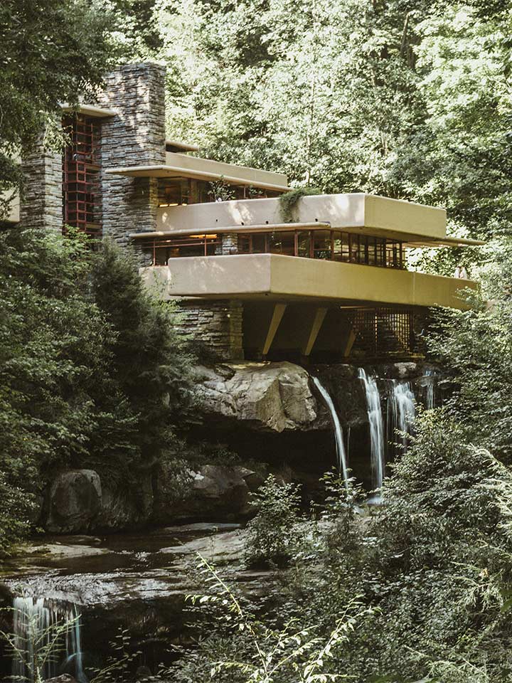 beautiful place in the woods with extended balconies and a waterfall beneath
