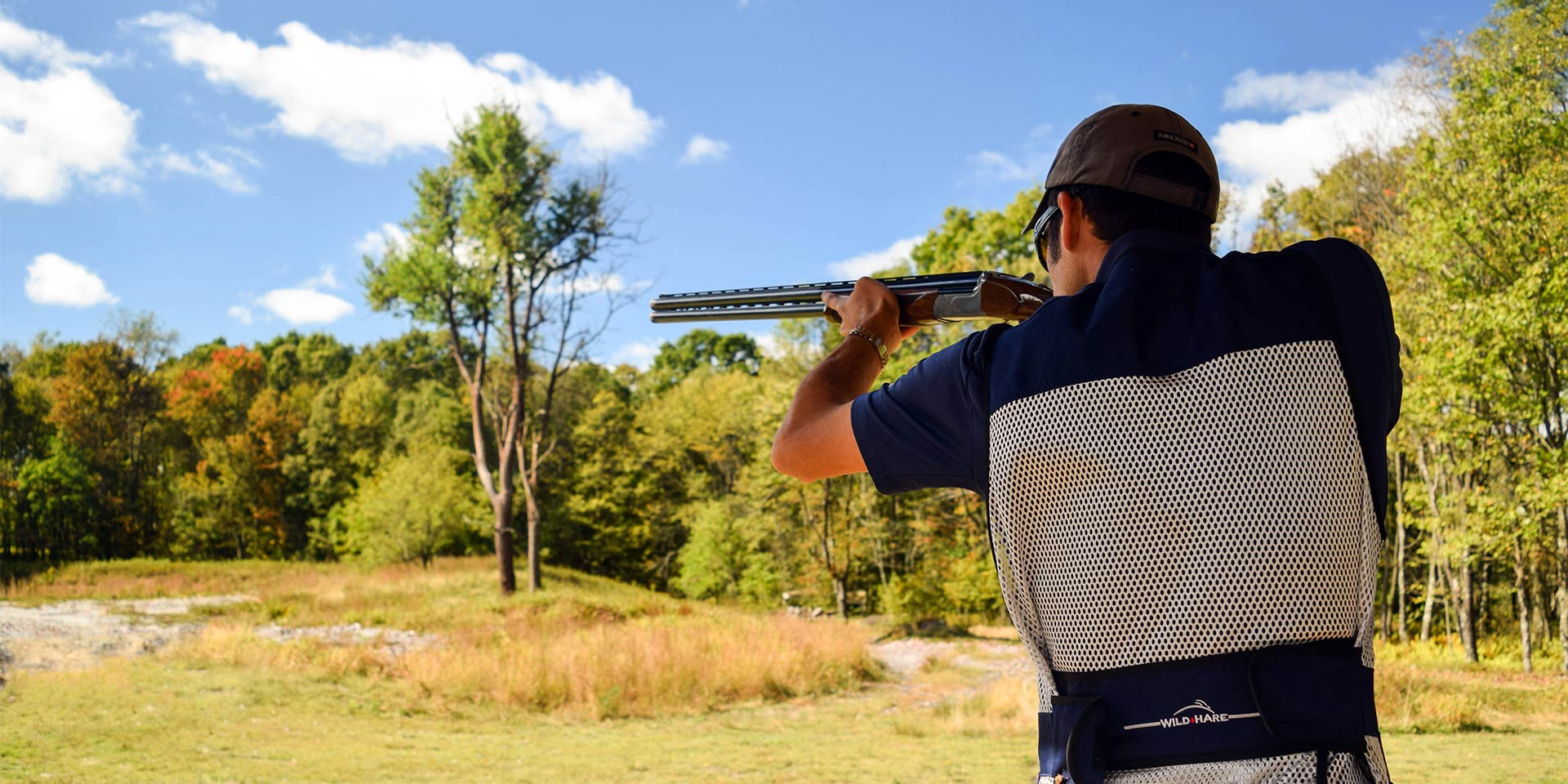 man shooting gun