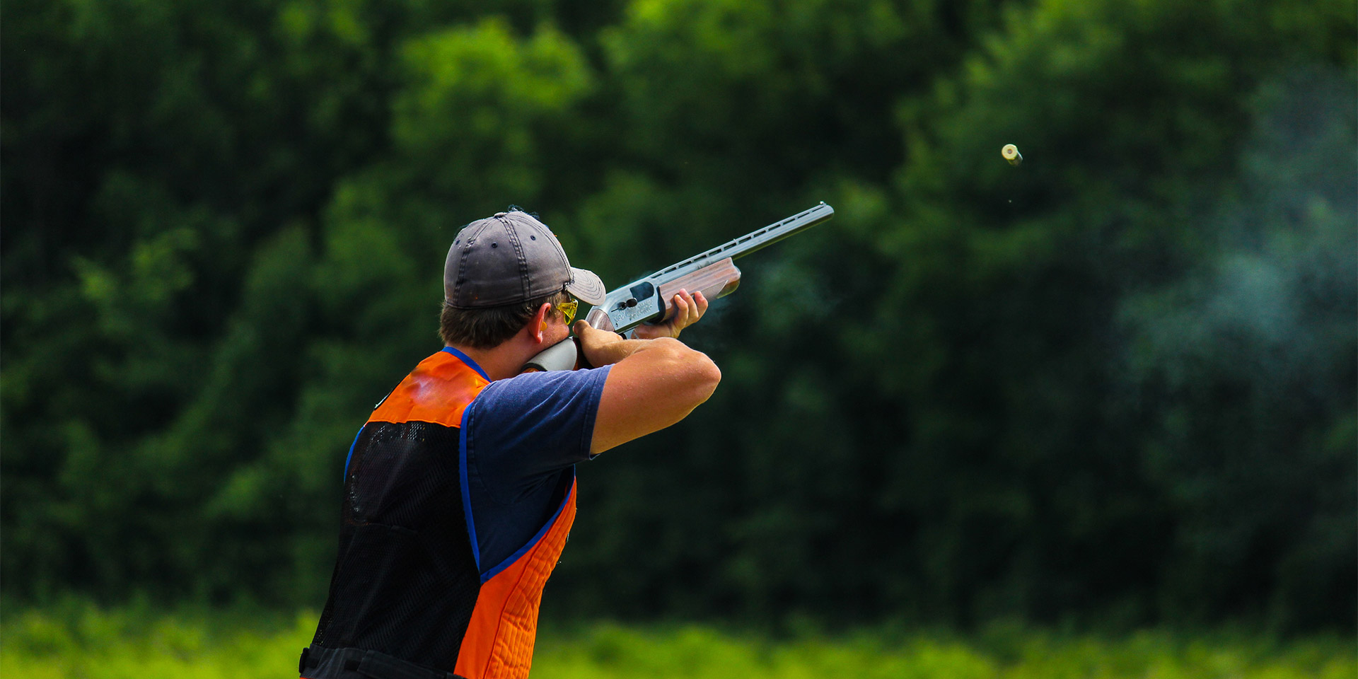 man shooting clays