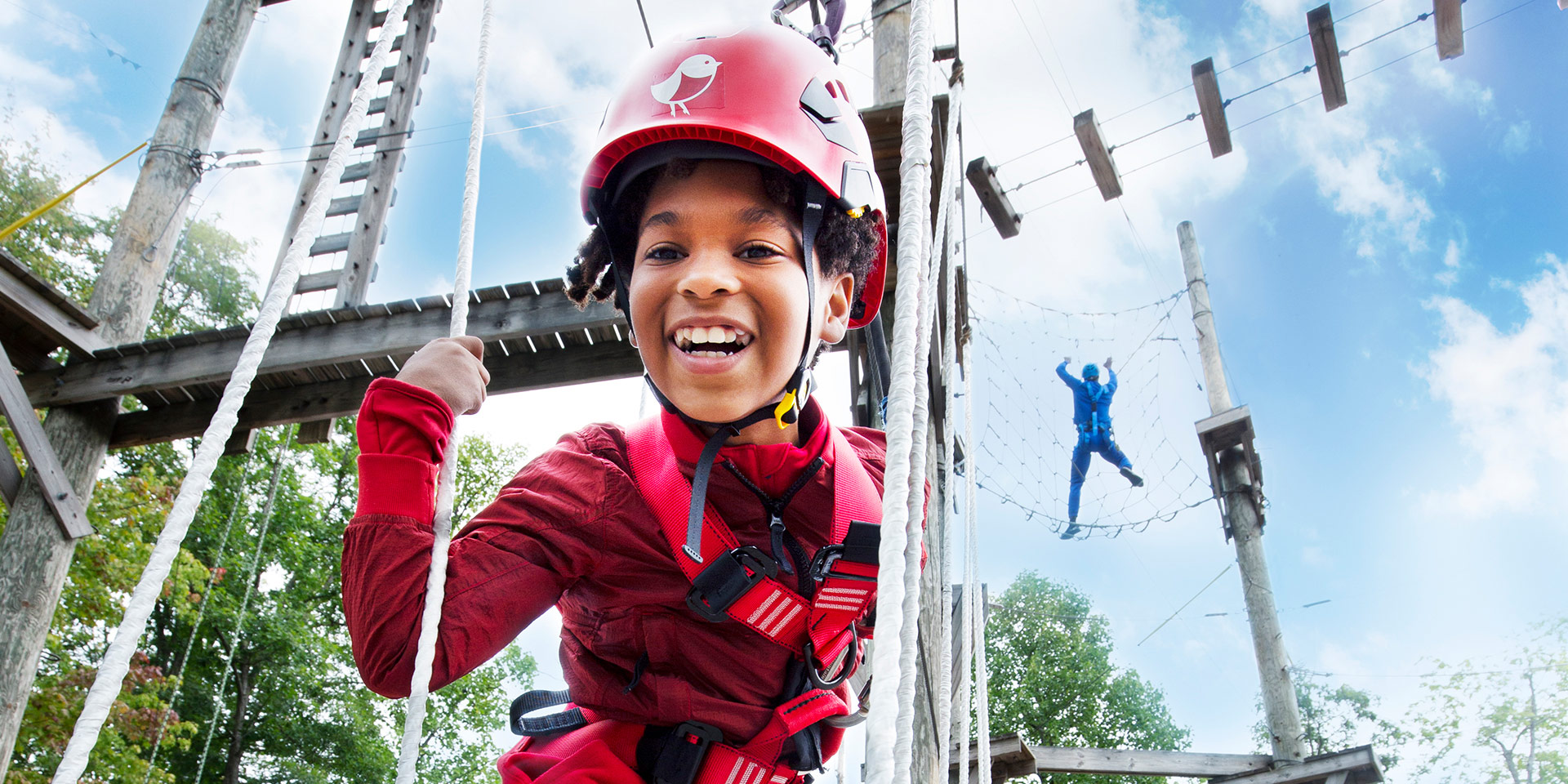 Child exploring ropes course