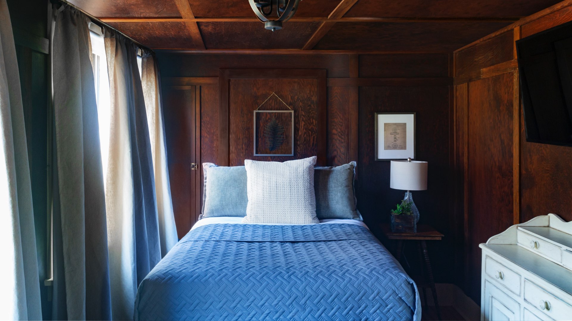 Bedroom with blue bedding