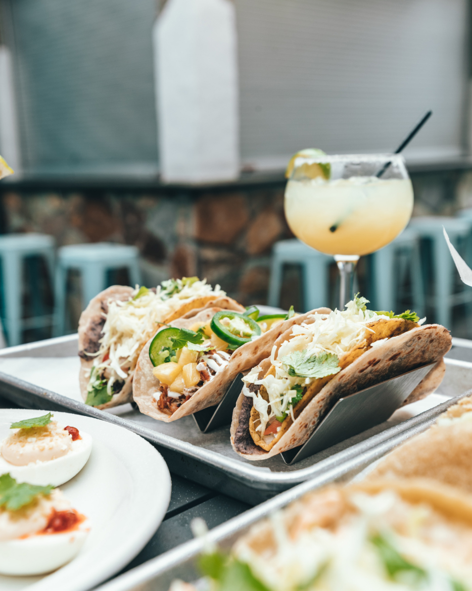 Tacos and a drink outdoors