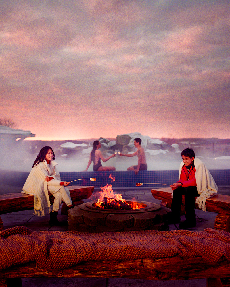 Kids enjoying smores at a campfire