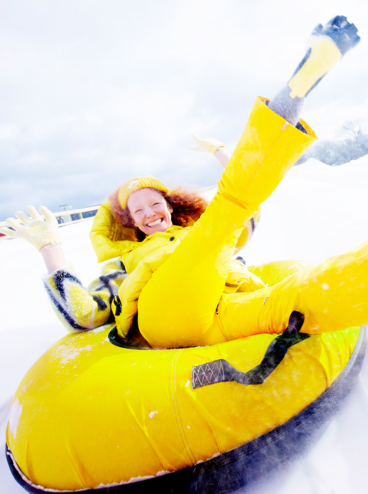 Lady on a snow tube