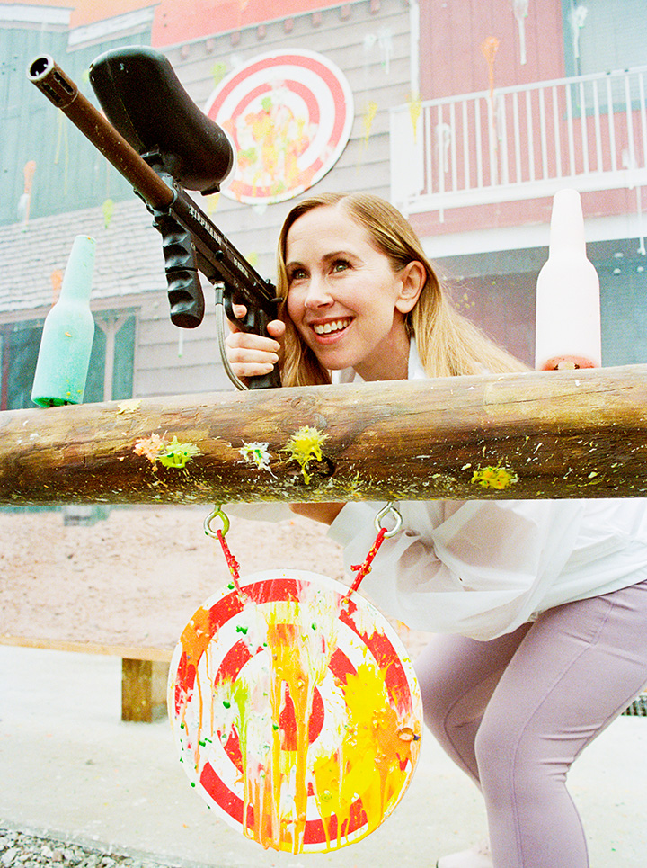 Lady playing paintball