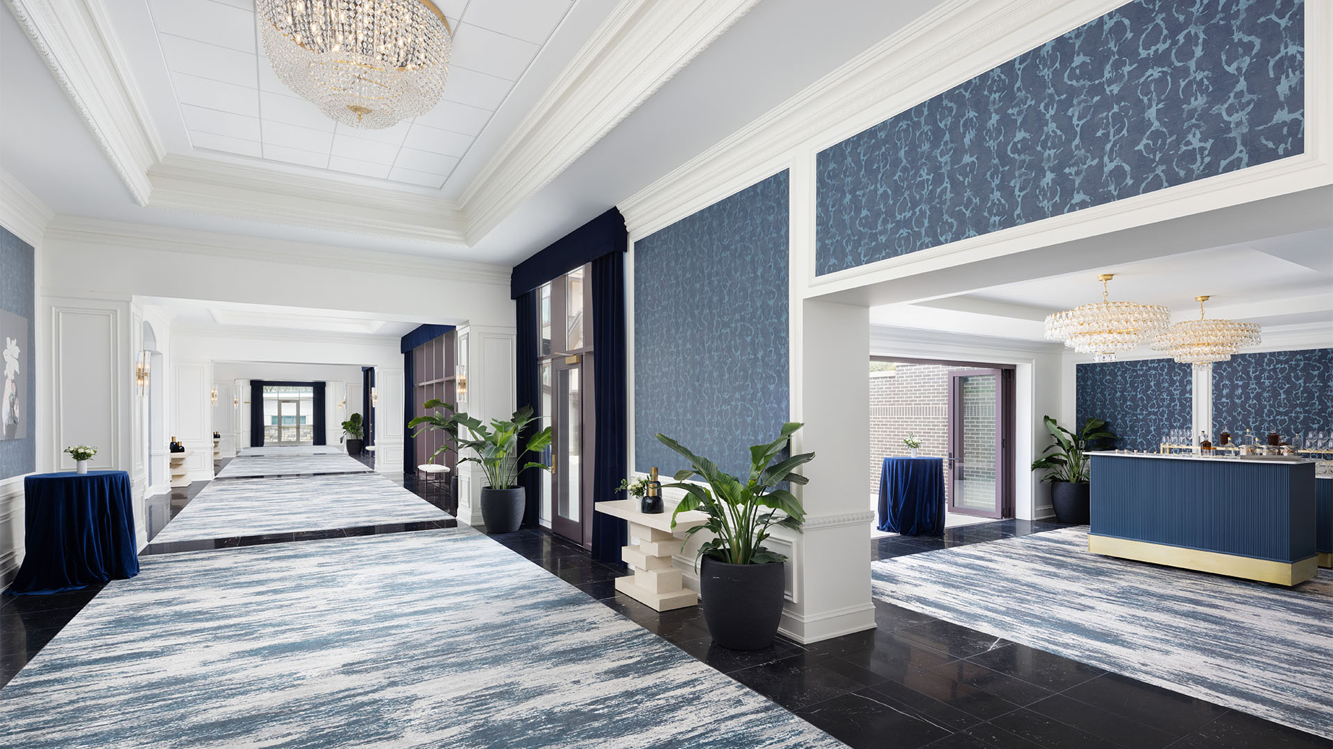 Hallways with blue accents. Blue carpet and blue wall details.