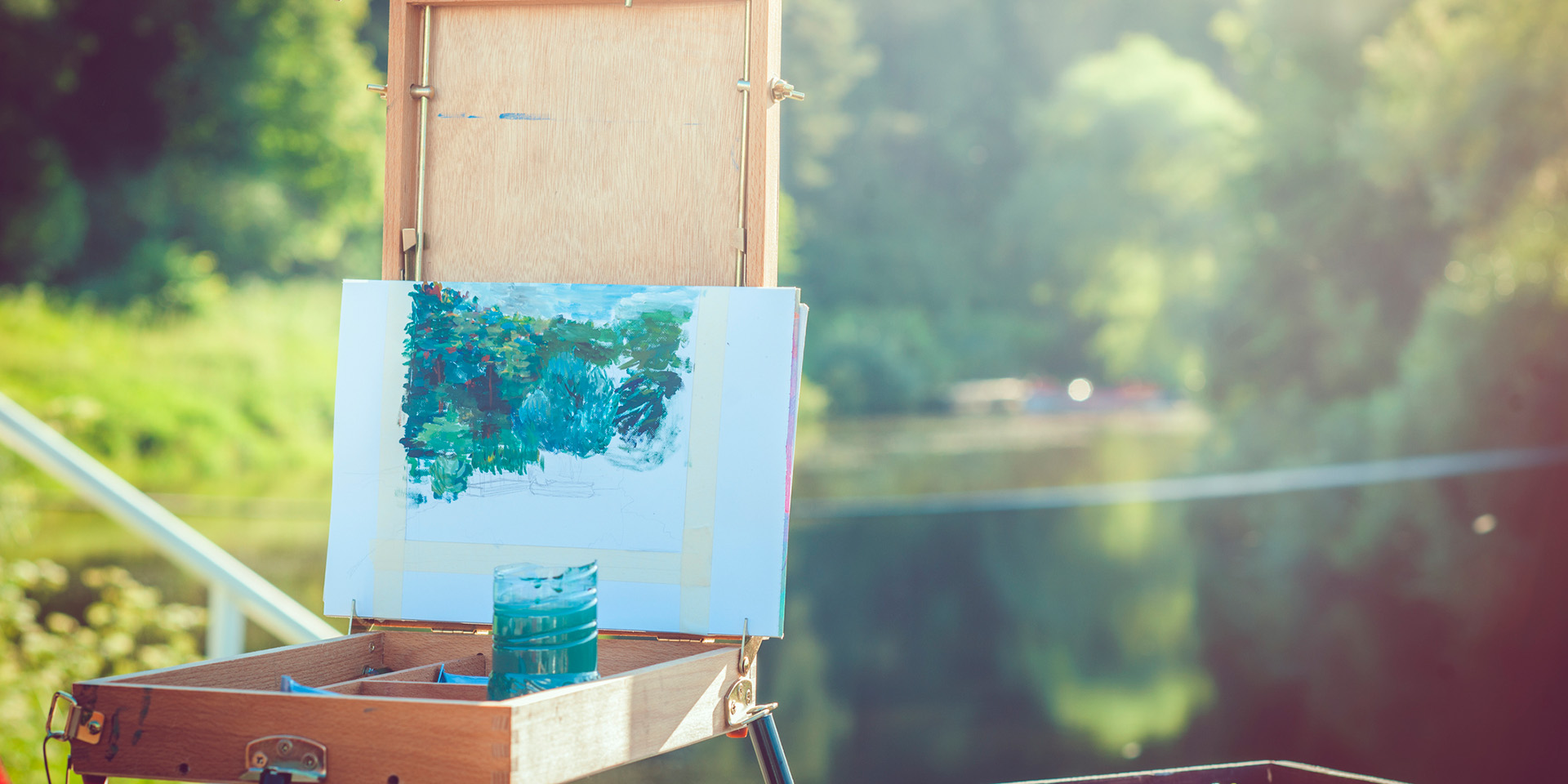 artist easel out by a lake