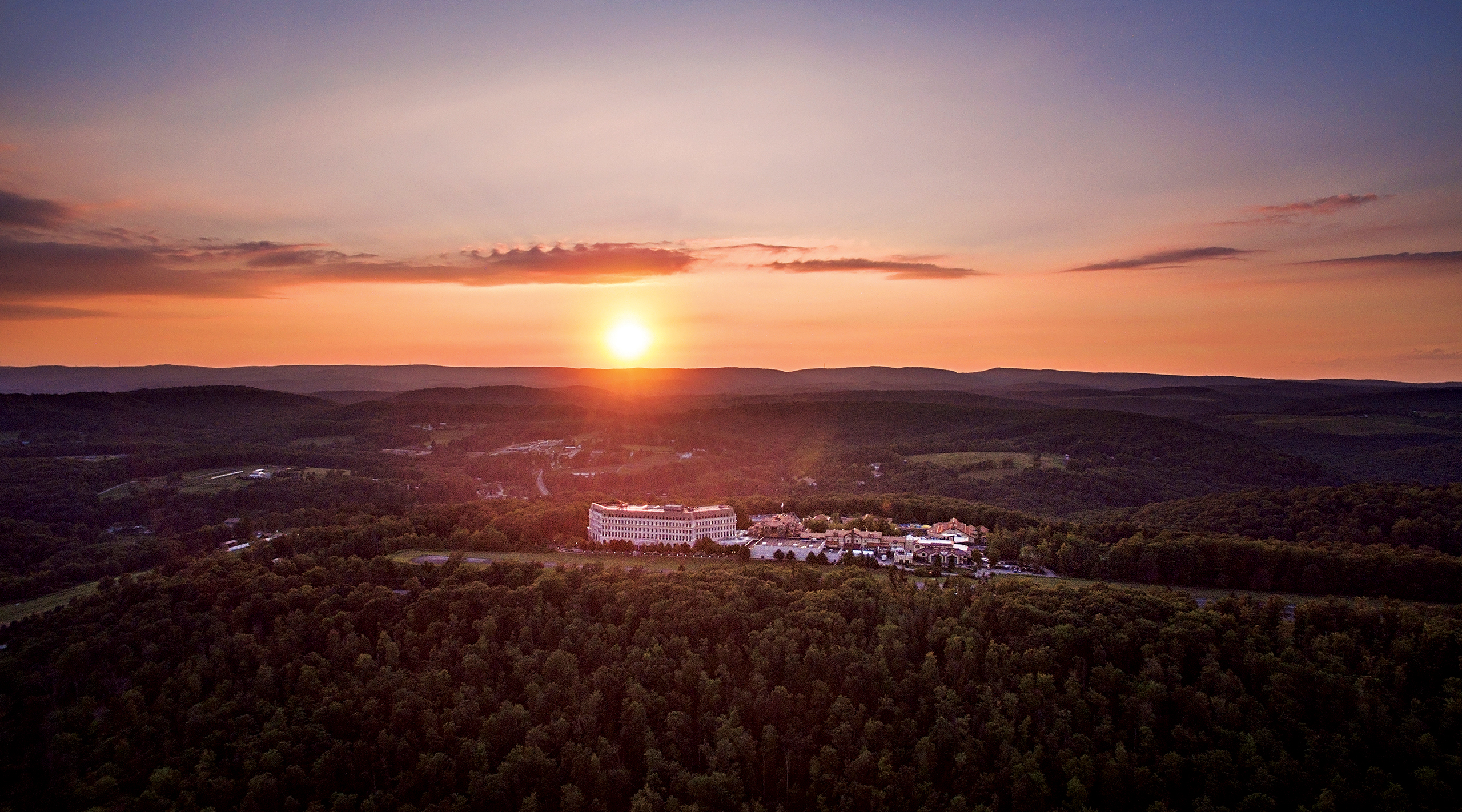 Aerial view of The Chateau and The Grand Lodge at Nemacolin at sunset
