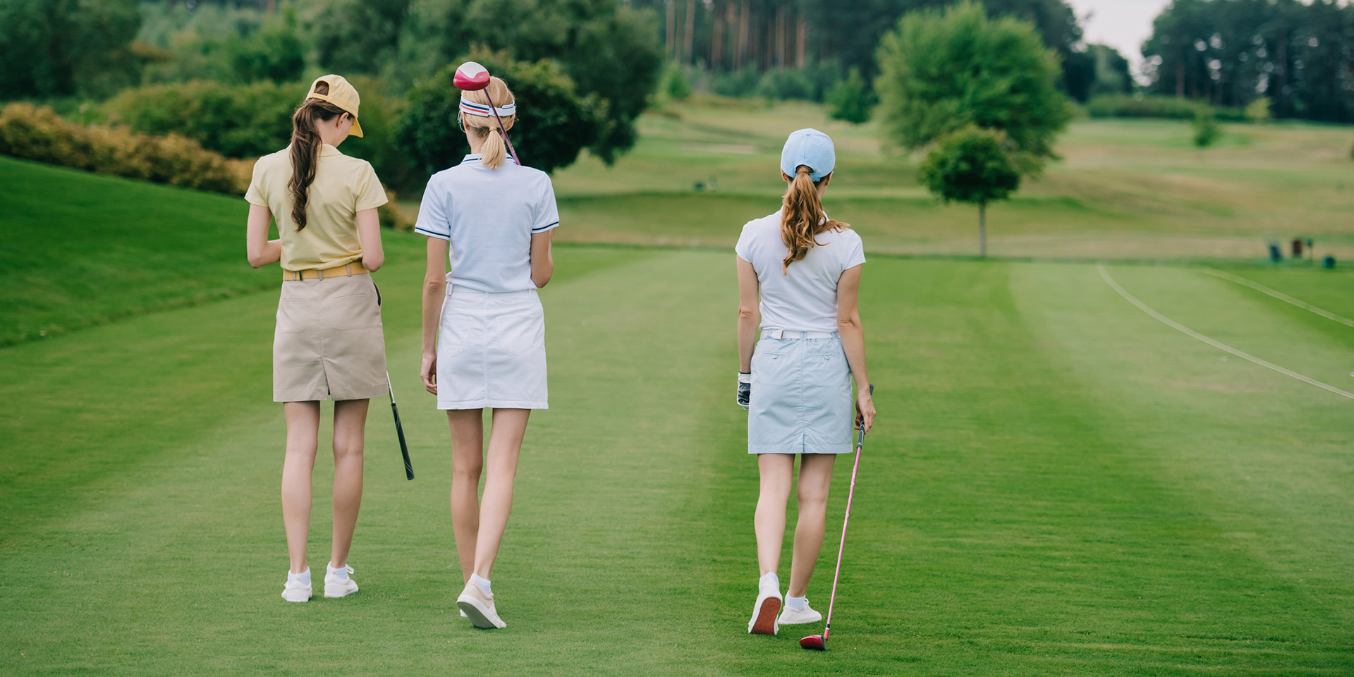 women on a golf course
