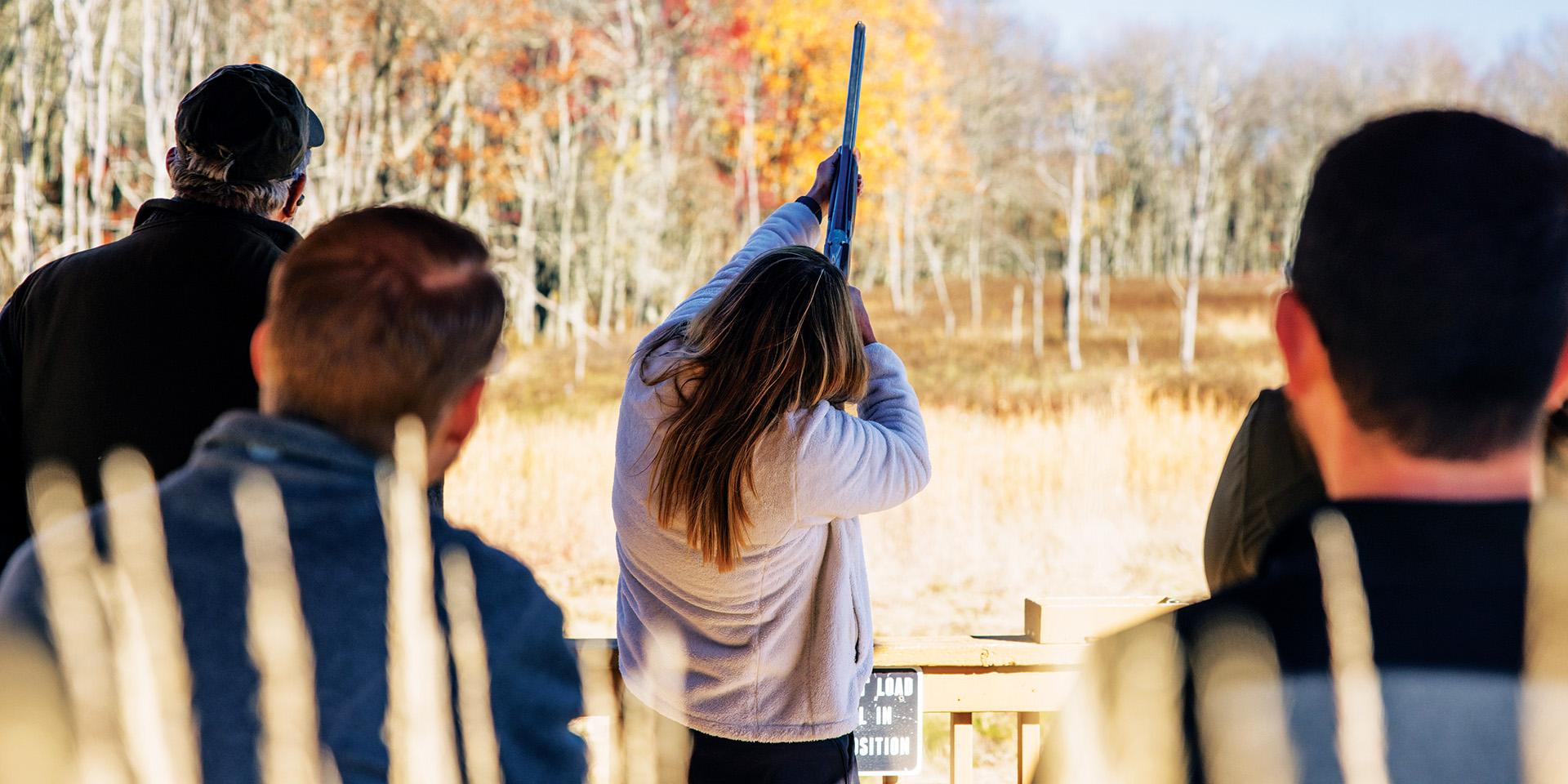 woman shooting sporting clays