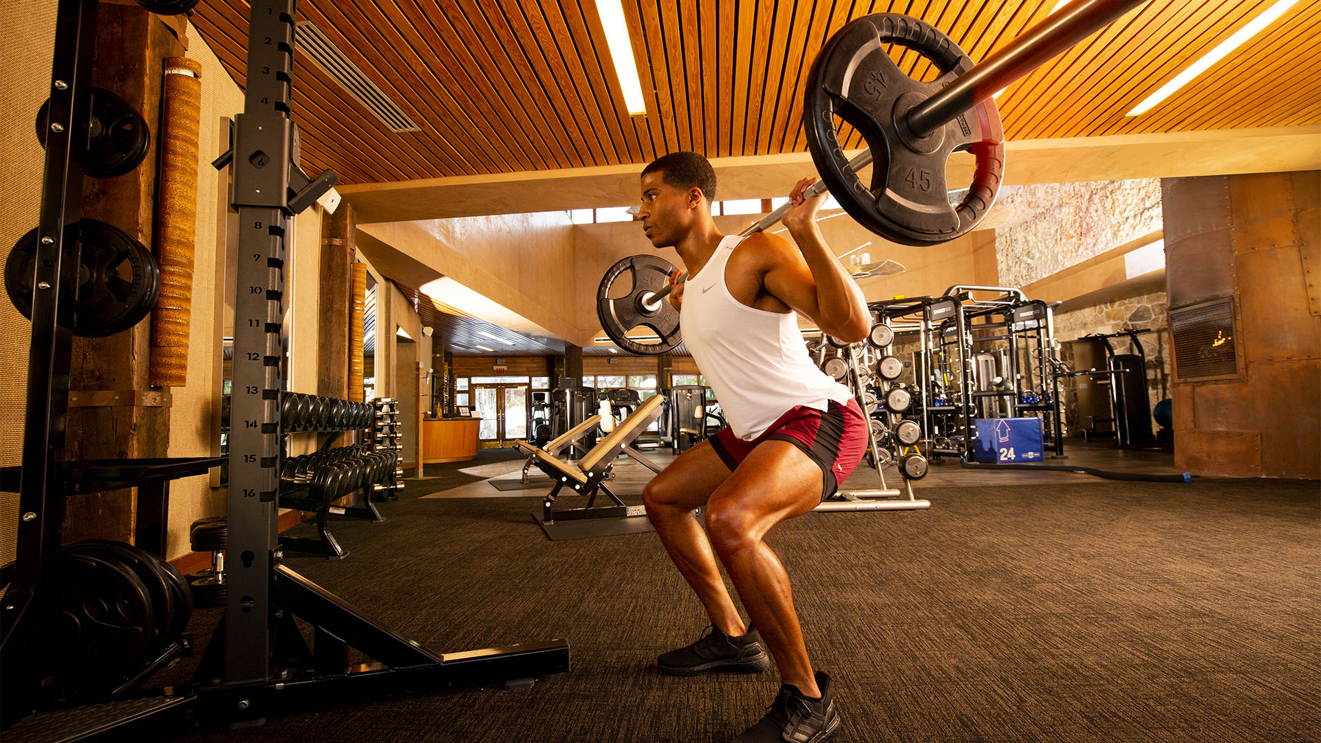 man lifting weights